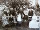 Damsbo Familien. Bagerst fra venstre: Carl Alfred, Sylvester, Peder Nielsen Damsbo, Niels Christian. Forrest fra venstre: Ellen, Peder Adolf, Emmy, Anna Nikoline, Marie (ca. 1907)
